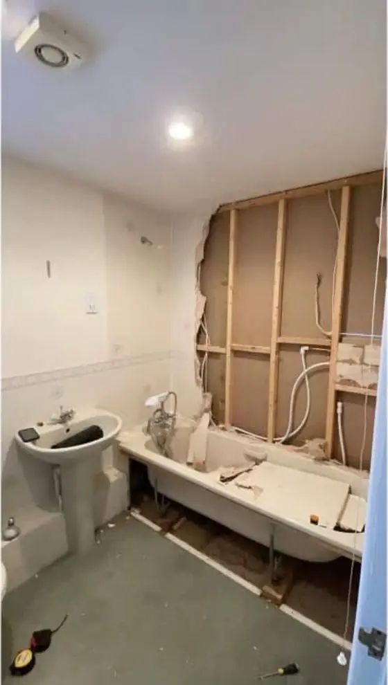 Bathroom stripped back to studs