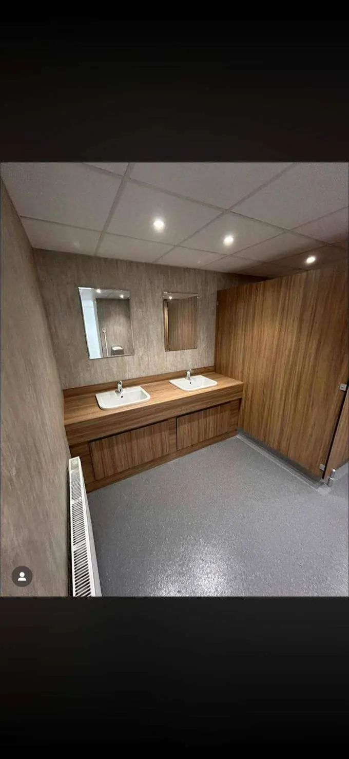 Bespoke walnut vanity with double undermount basins