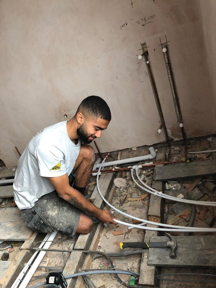 First-fix plumbing by SWW — Speedfit manifold run through a stud wall