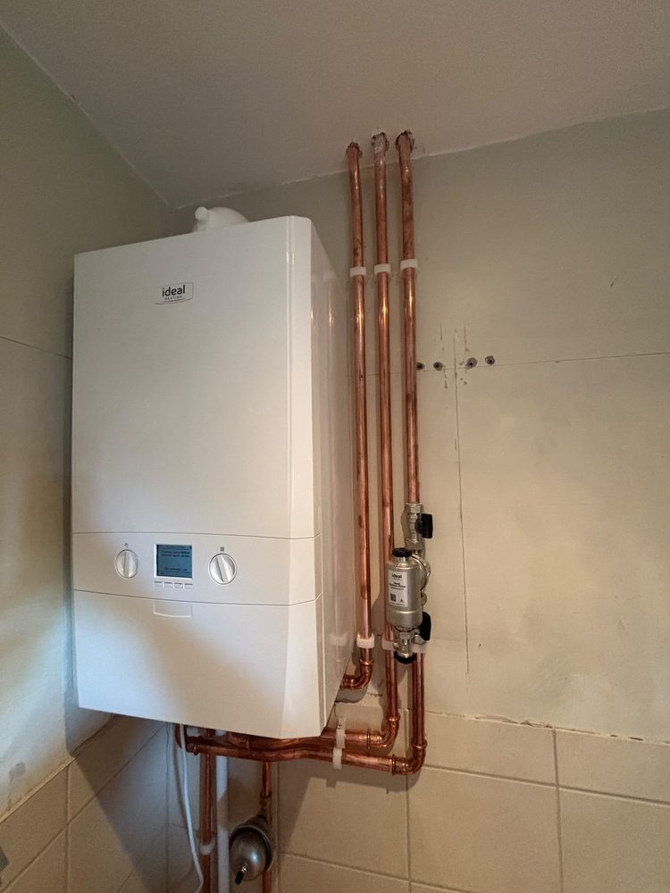 Finished Ideal boiler install with copper pipework by SWW